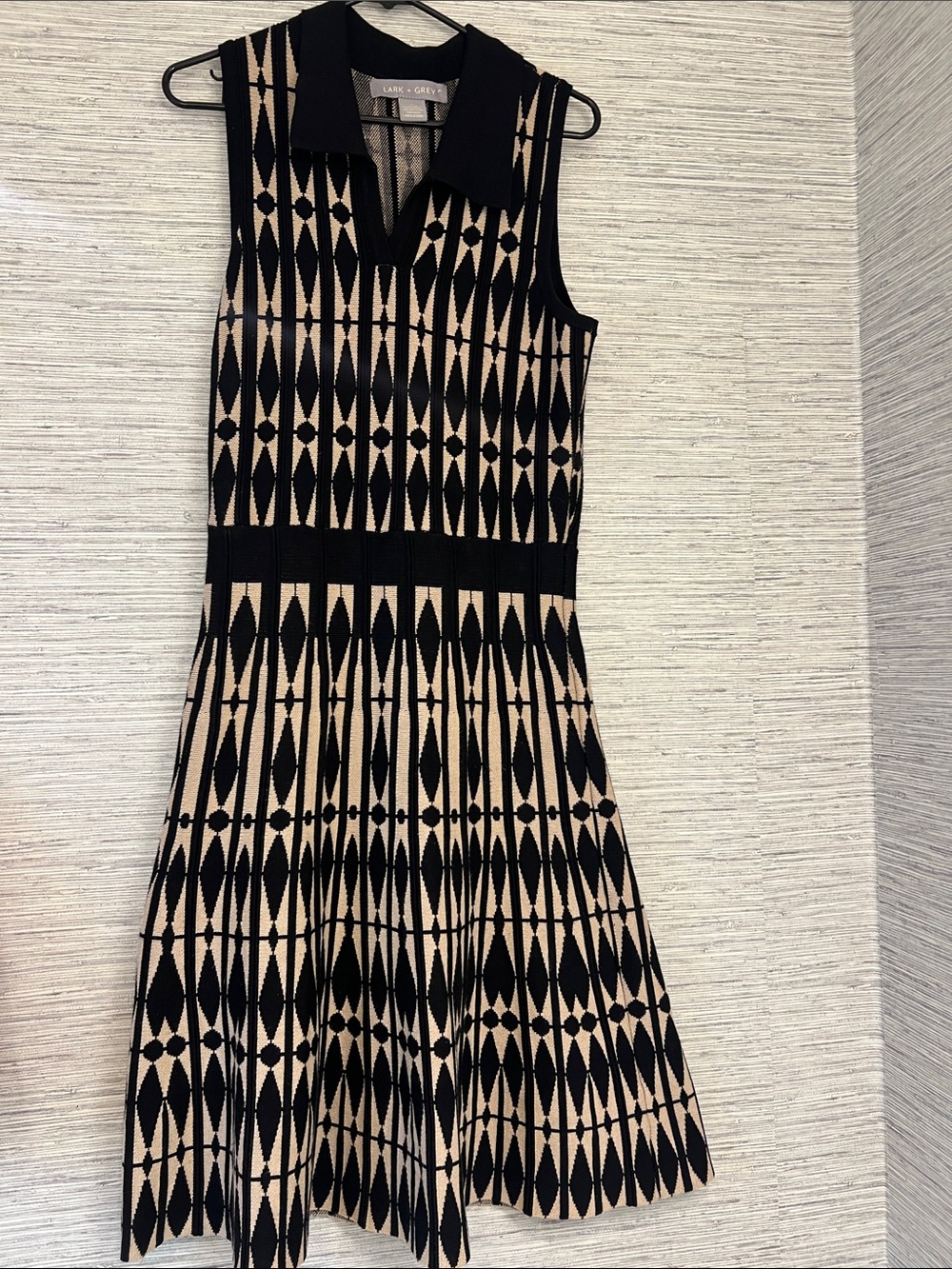 Sleeveless Geometric Knit Asymmetrical Dress in Black and Beige by Lark & Grey